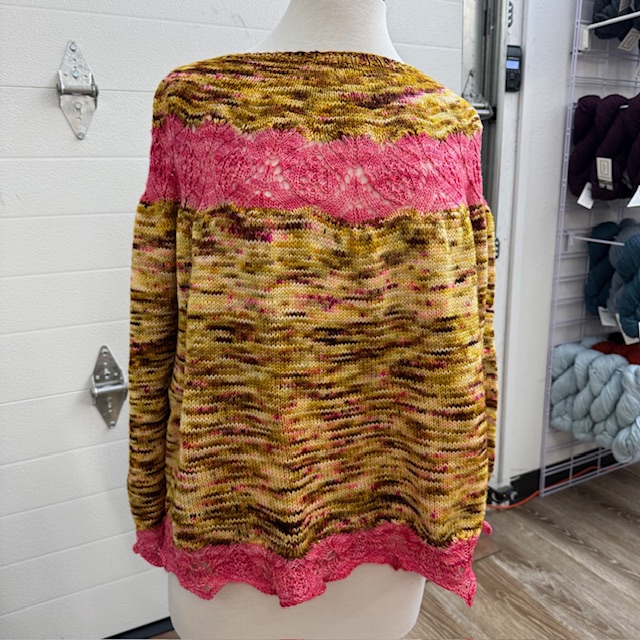 Dimi's La Mascarada Sweater by Catherine Rein using Dream in Color Smooshy and Malabrigo Sock.